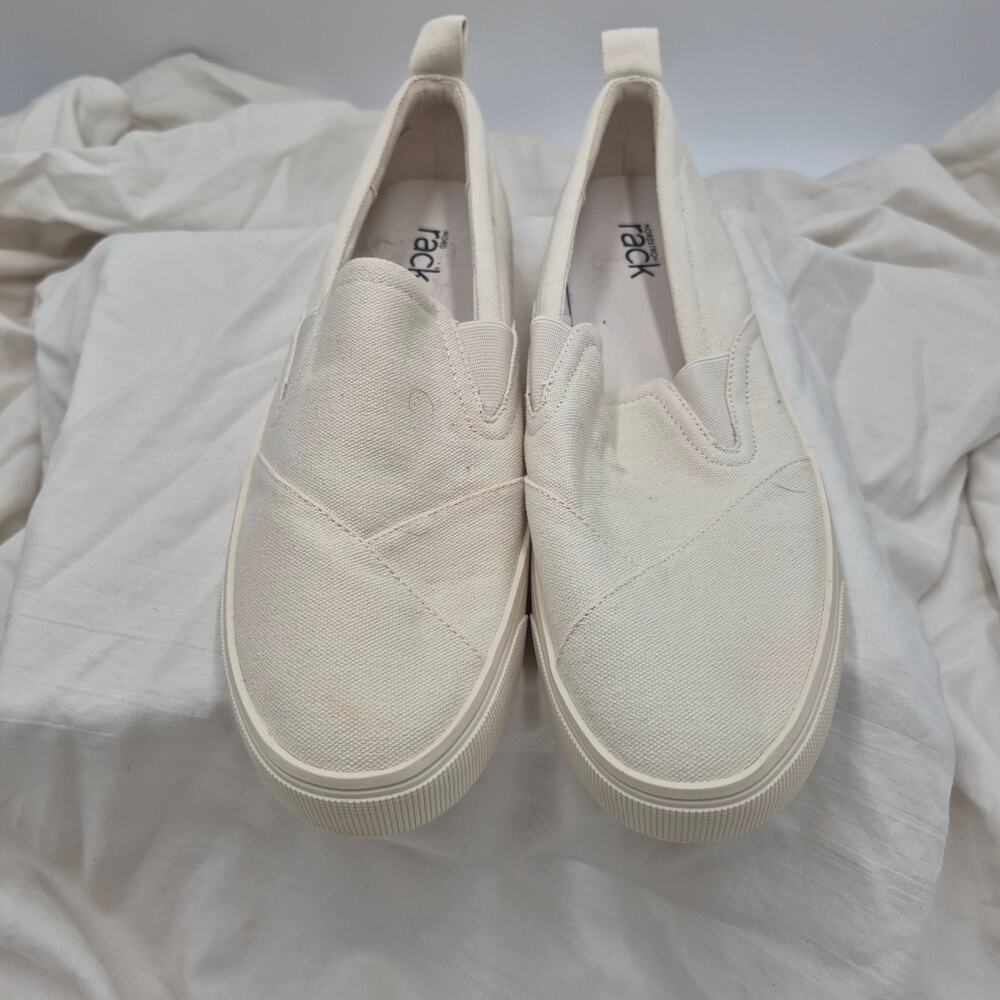RACK white canvas slip-on sneakers appear to be the size 8